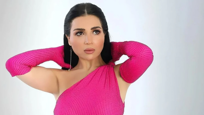 مي عز الدين تسلم فستان زفاف فيلم "عمر وسلمى" بعد مسابقة أطلقتها - صور