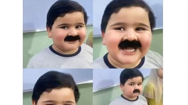 طفل عراقي يضع شارب مستعار ويتصدر السوشيال ميديا .. ما قصته؟