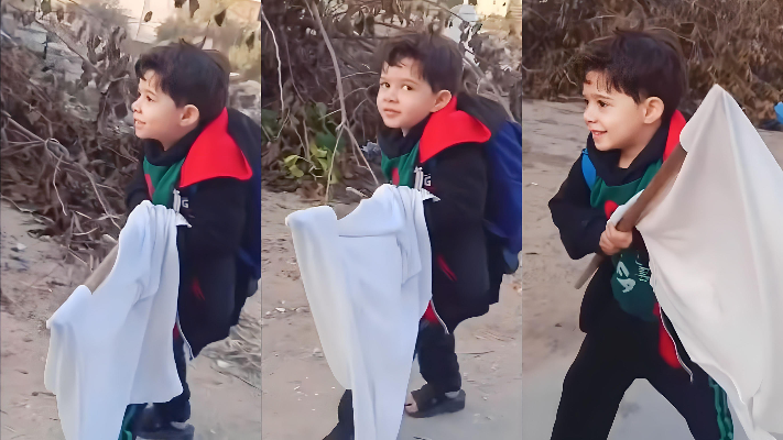 بعد انتهاء الهدنة وتجديد القصف .. هذا الطفل يركض باحثًا عن مكانٍ آمن حاملًا الراية البيضاء